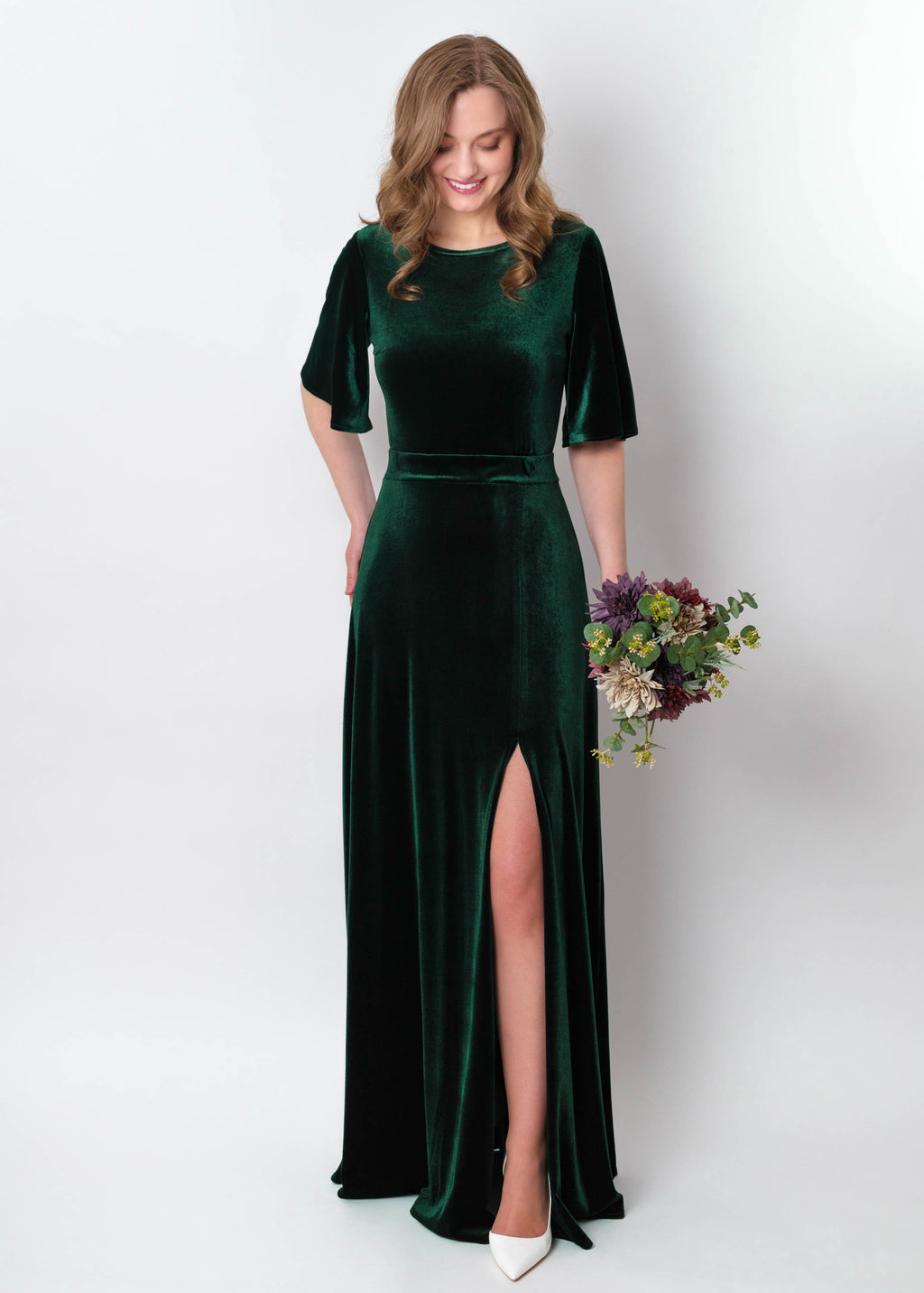 Emerald green velvet long slit dress