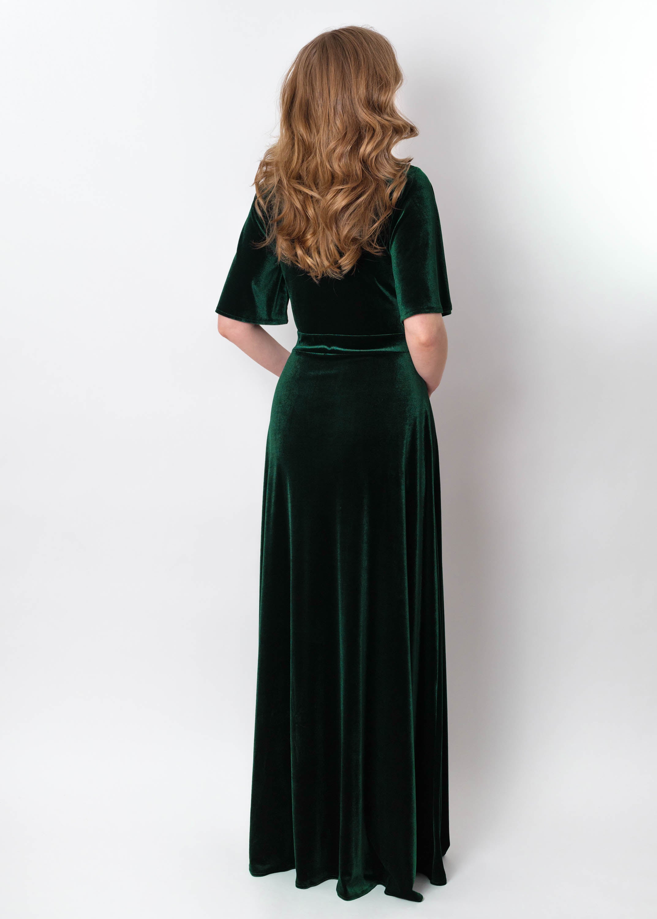 Emerald green velvet long slit dress