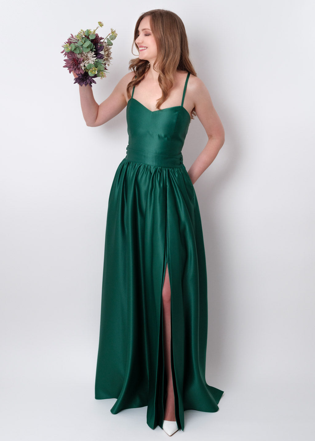 Emerald green slit satin open back dress