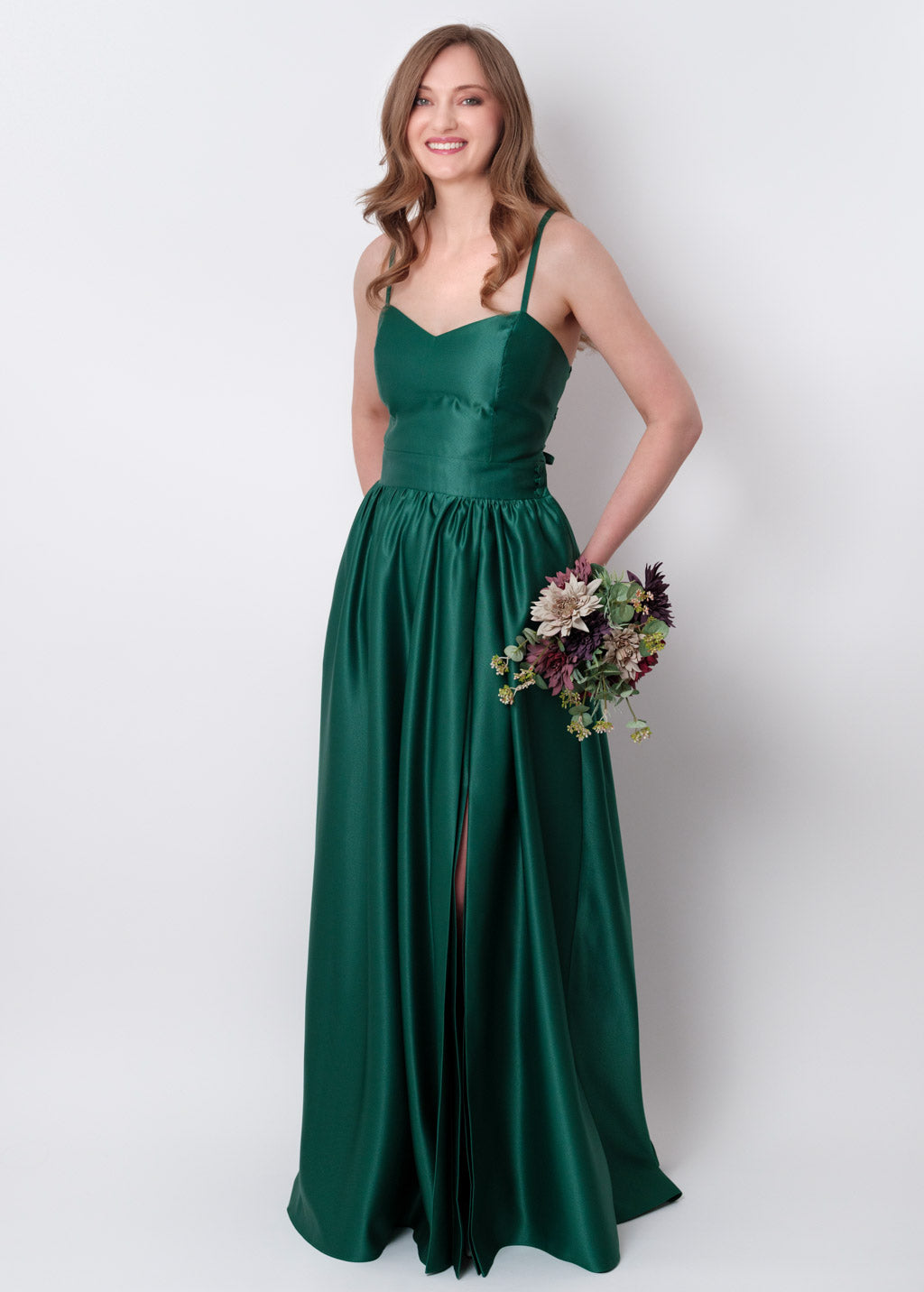 Emerald green slit satin open back dress