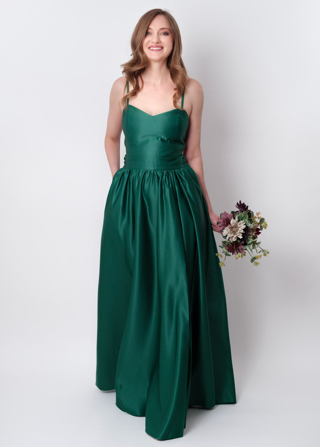 Emerald green slit satin open back dress