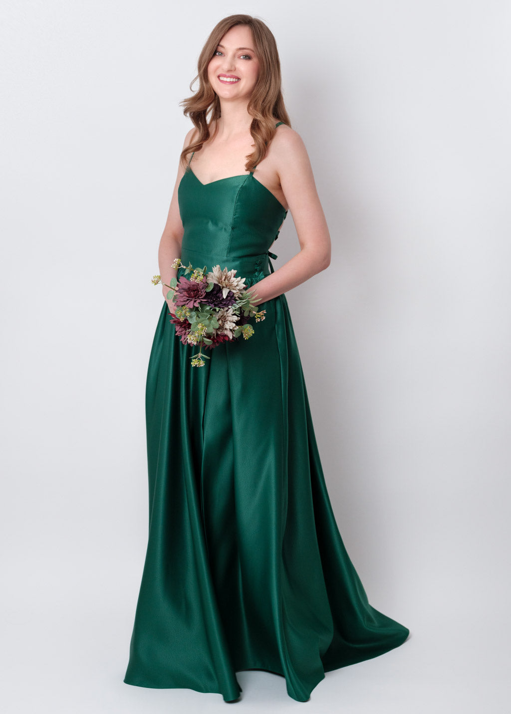 Emerald green slit satin open back dress