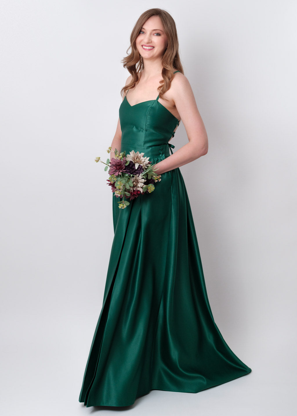 Emerald green slit satin open back dress
