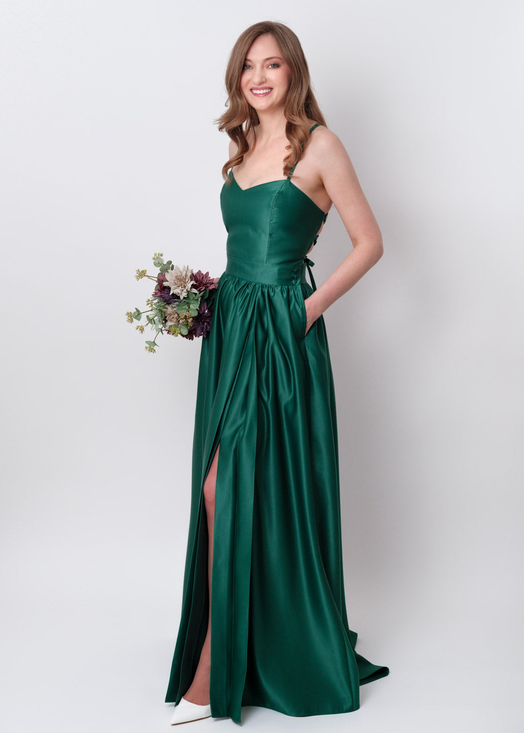 Emerald green slit satin open back dress