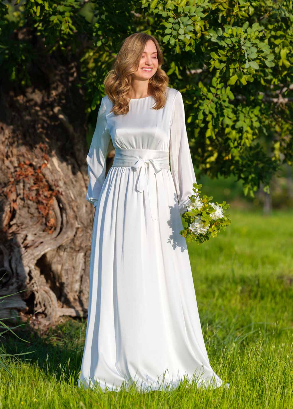 Ivory silk wedding dress with belt