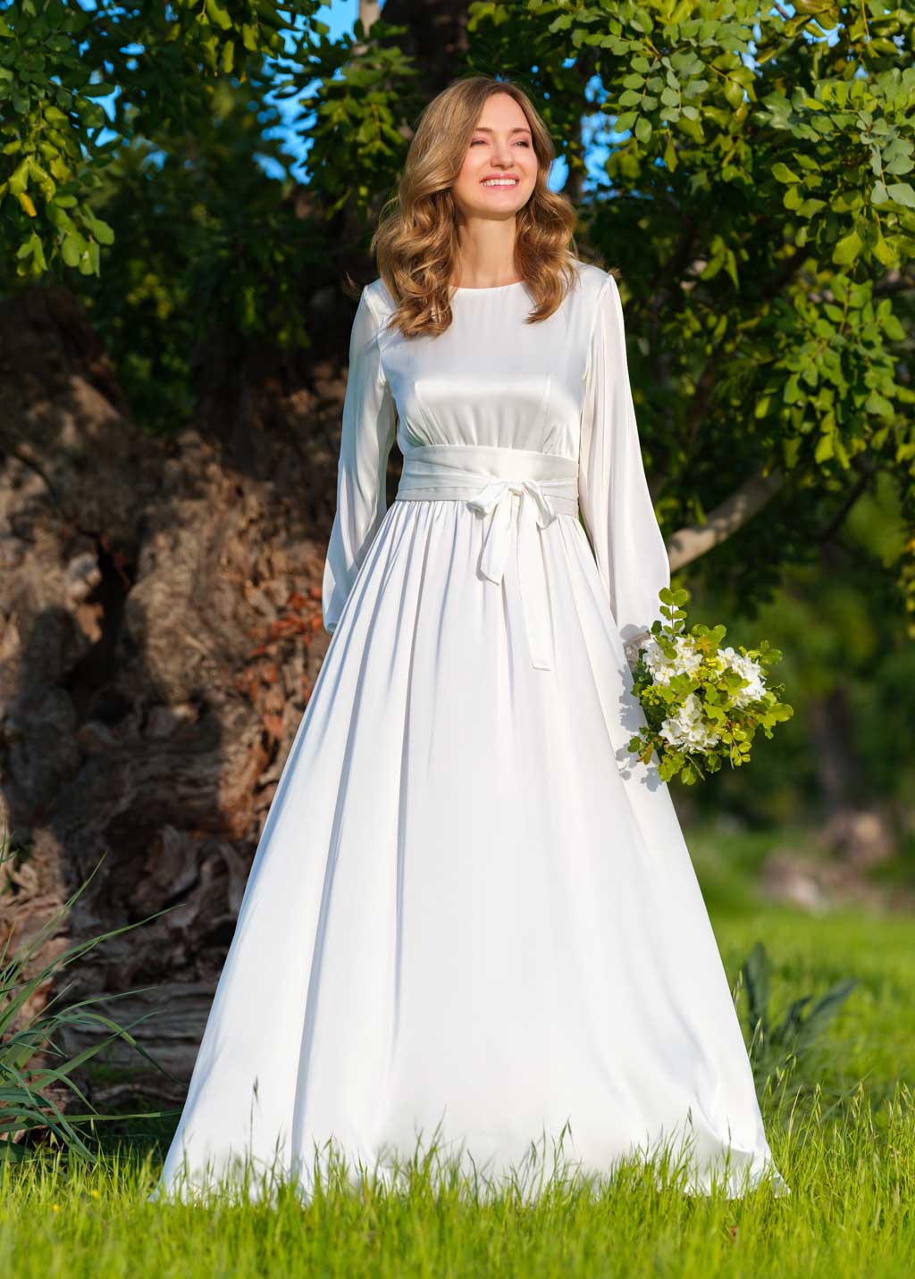 Ivory silk wedding dress with belt