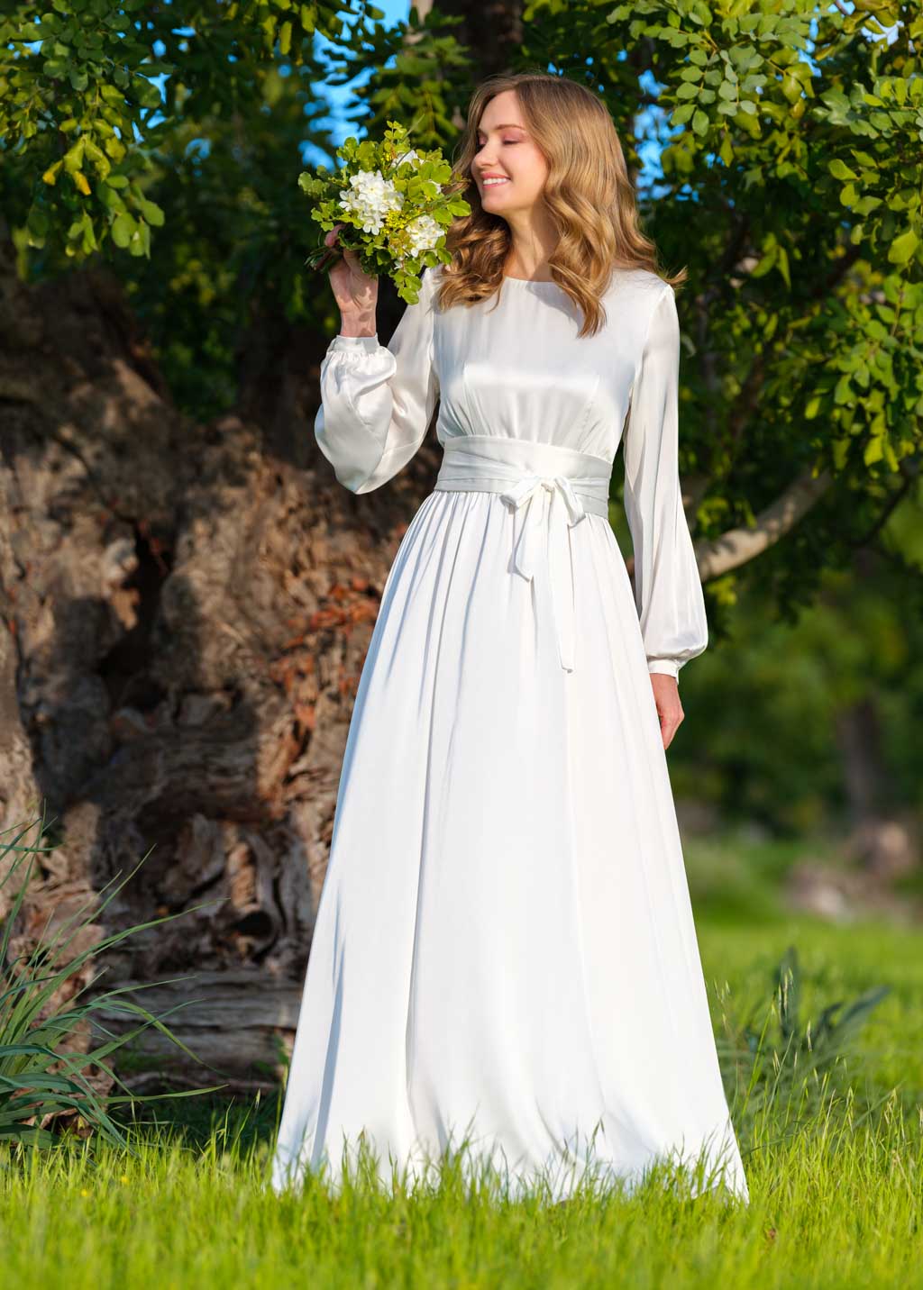 Ivory silk wedding dress with belt