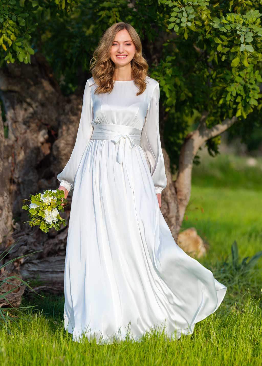 Ivory silk wedding dress with belt