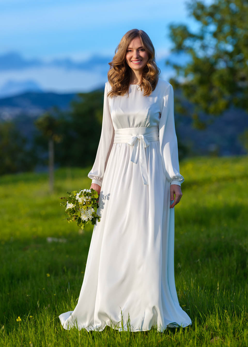 Ivory silk wedding dress with belt
