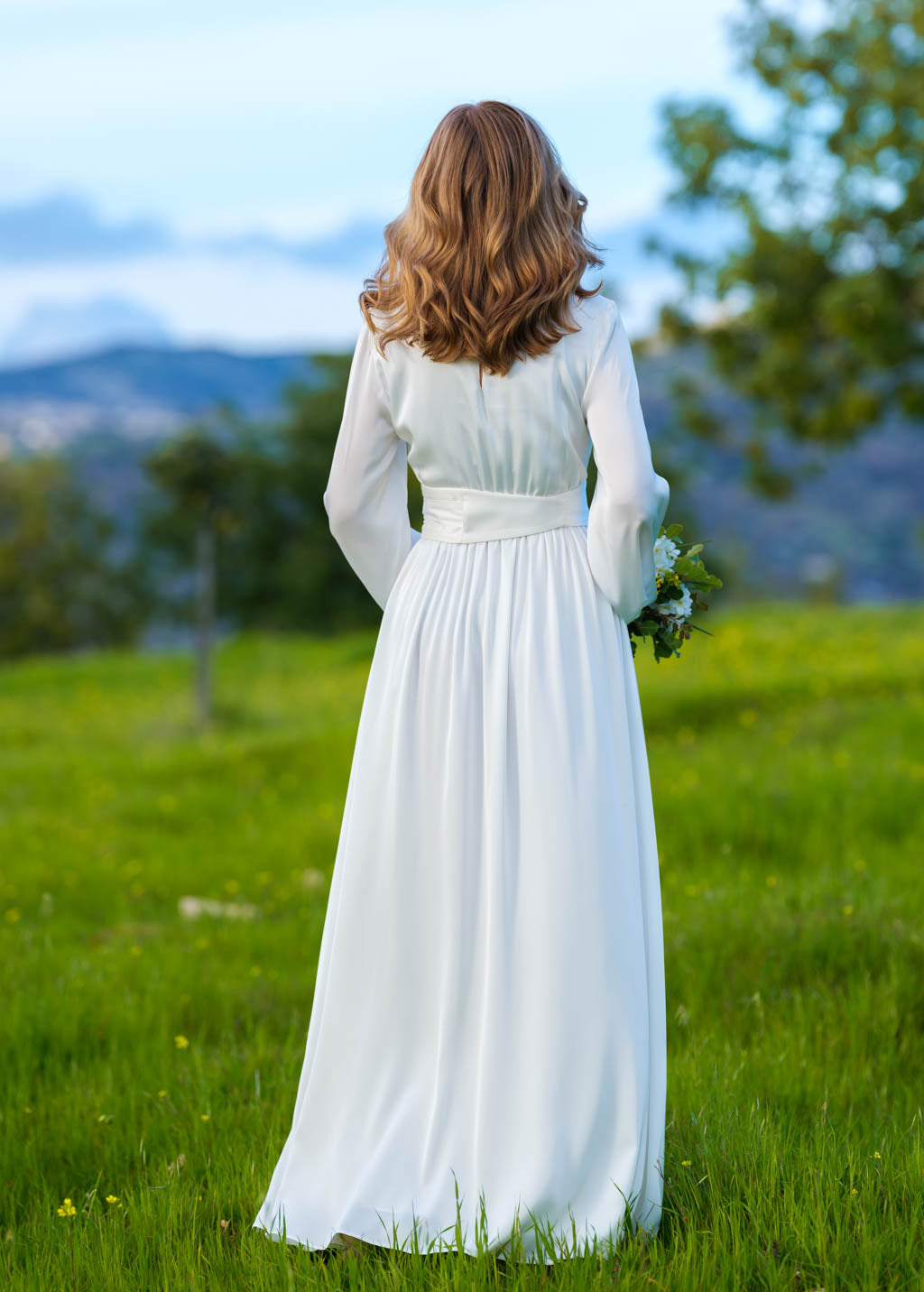 Ivory silk wedding dress with belt