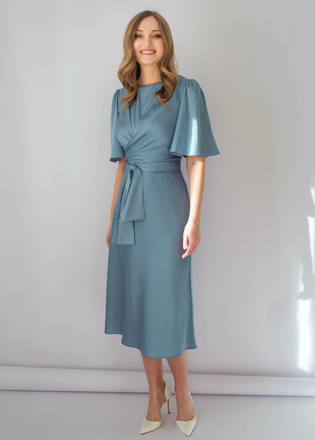 Silk midi dress in Dusty Blue with flutter sleeves and versatile belt tie