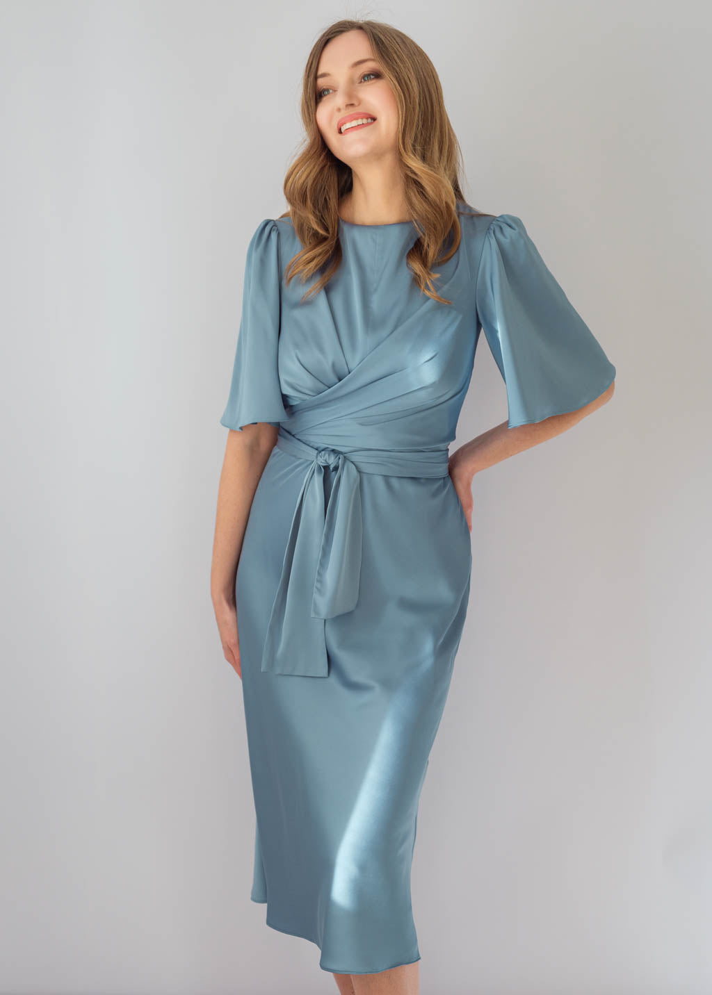 Silk midi dress in Dusty Blue with flutter sleeves and versatile belt tie
