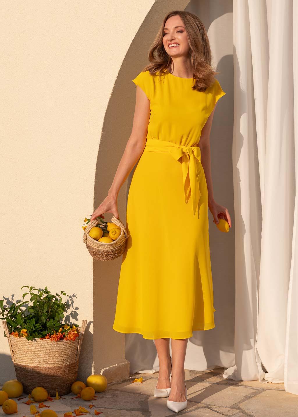 Yellow chiffon dress with belt