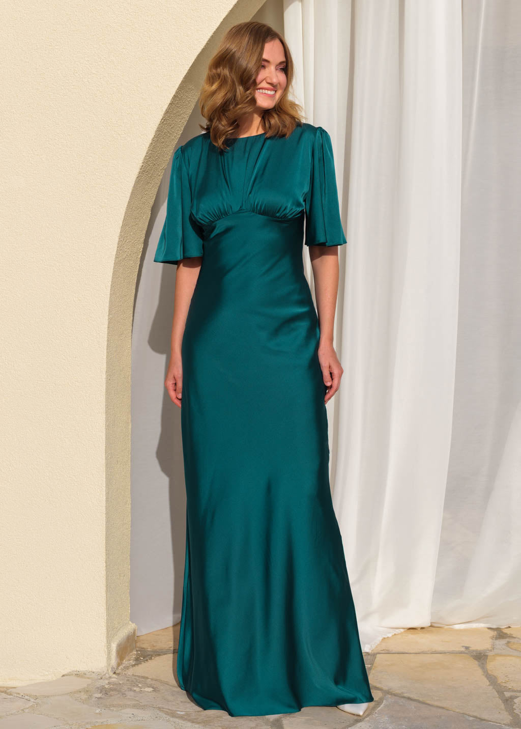 Teal silk gown with flutter sleeves