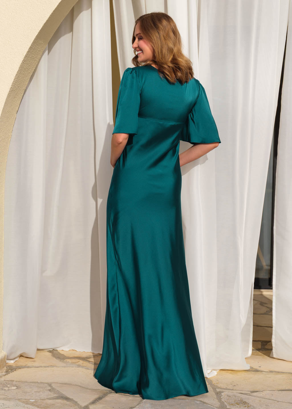 Teal silk gown with flutter sleeves
