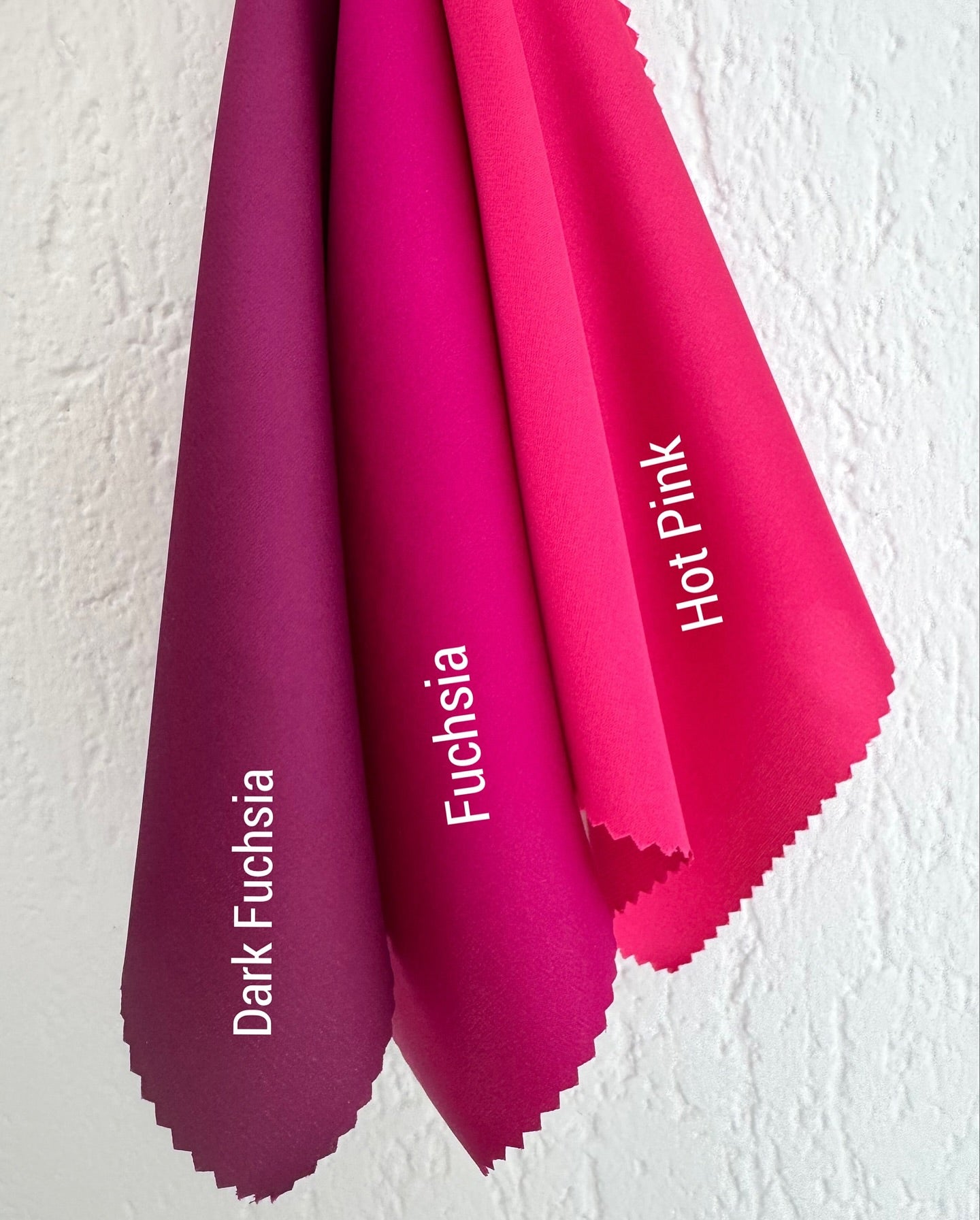 Fuchsia silk jumpsuit with pockets and open back